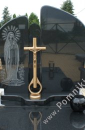 Nagrobek z czarnego granitu z ręcznie wykutym wizerunkiem Matki Boskiej